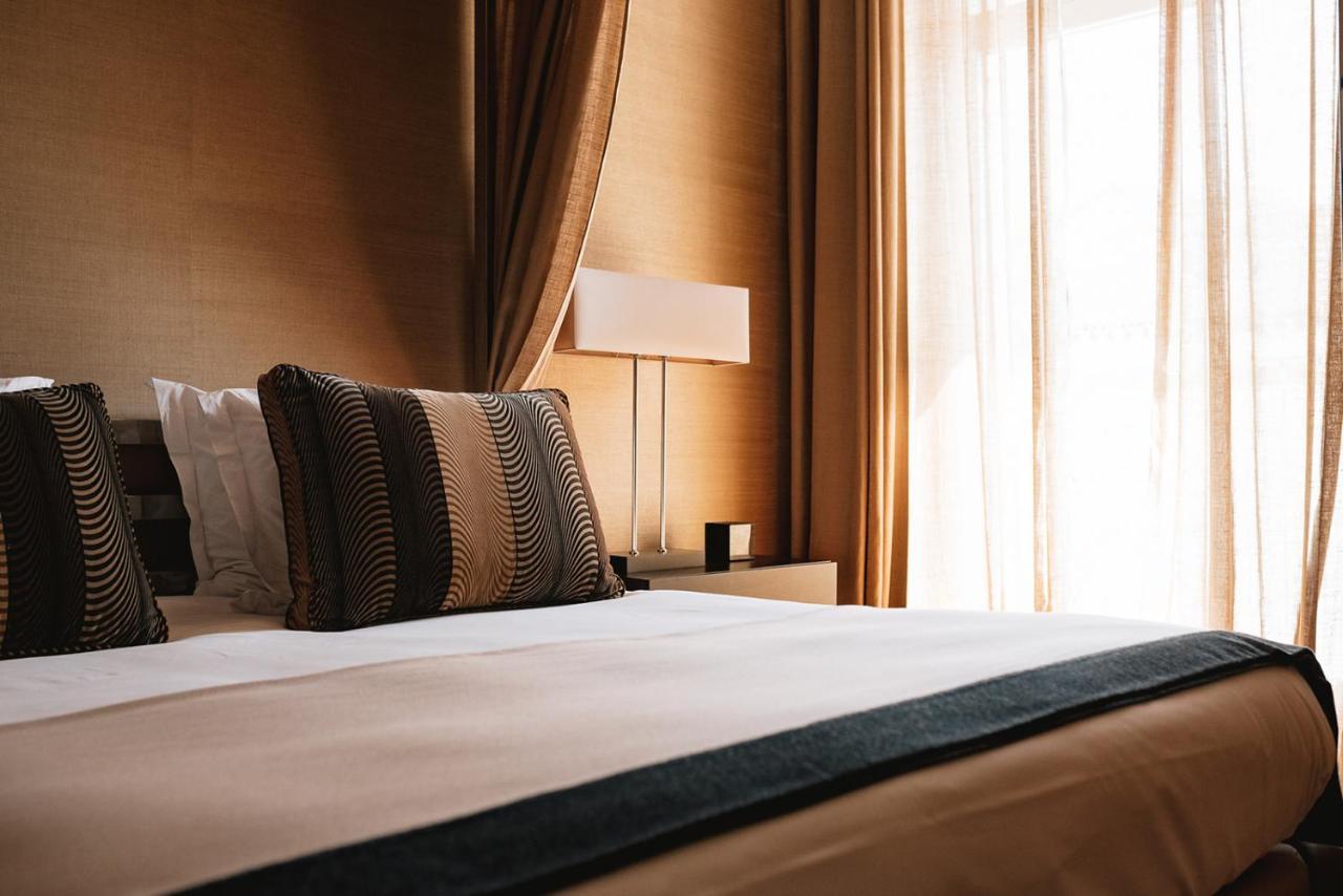 M'Ar De Ar Aqueduto Hotel Evora Ngoại thất bức ảnh A bed
